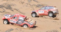 BMWs racing in Dakar
